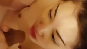 Asian sucking and getting cum on face
