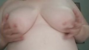 Short Haired Thicc Bitch Strip Teases and Plays with Her DDD Titties