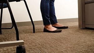 A Look At An Office Managers Well Worn Black Ballet Flats